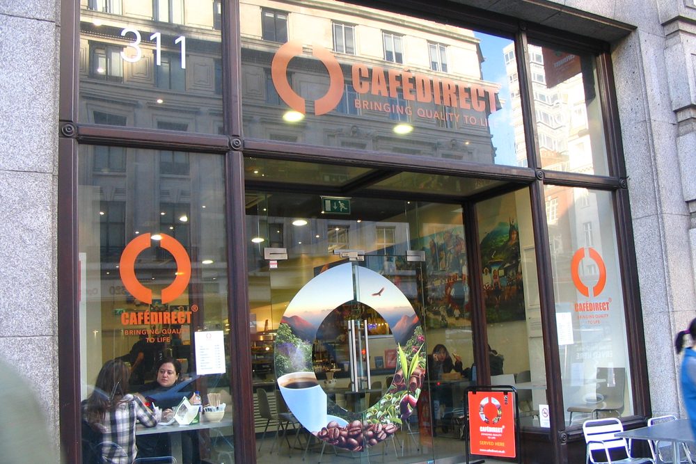 The frontage of an independent coffee shop on a city street
